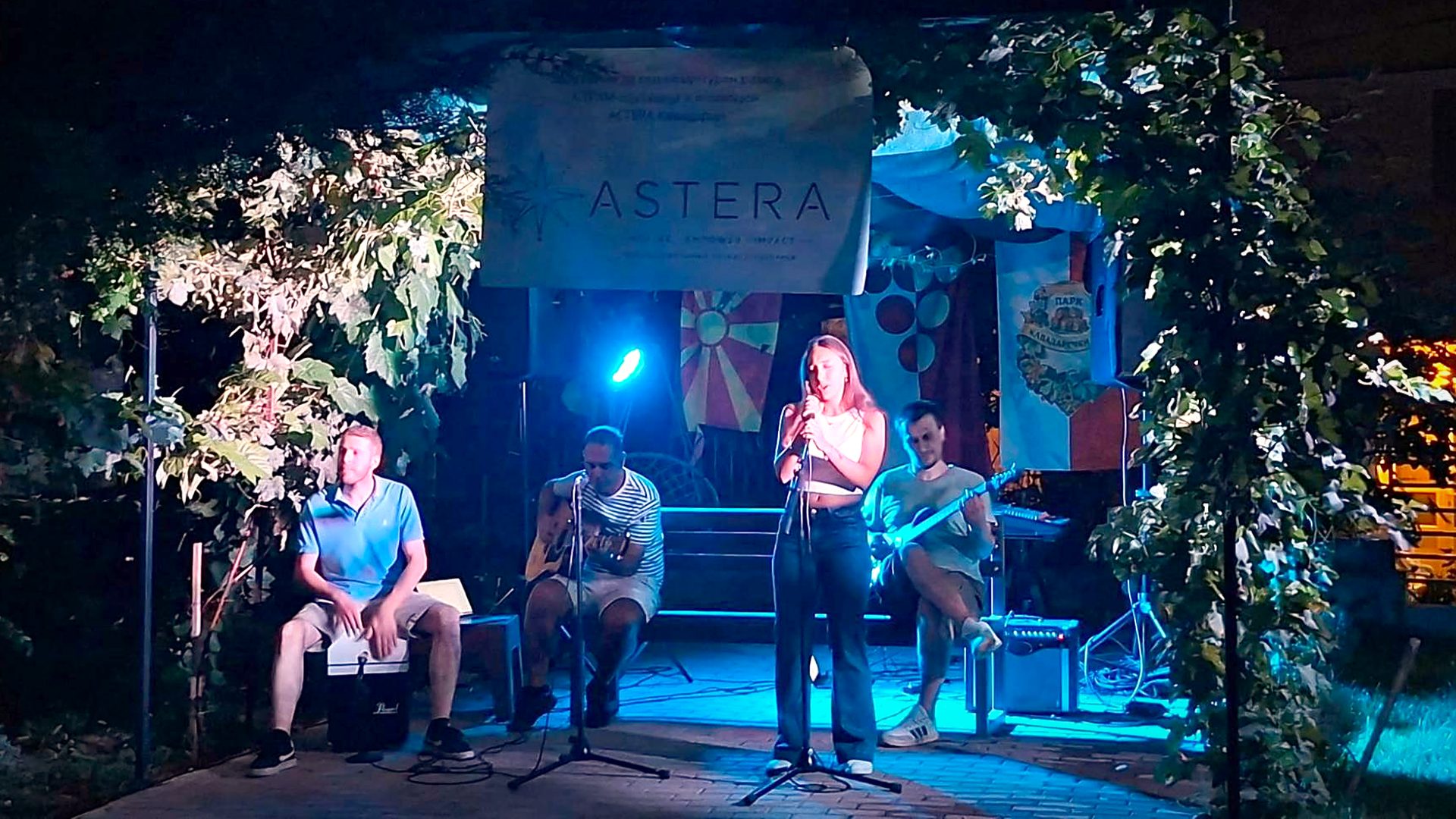 A young singer with her backing band on the open-air stage at the NGO Info Centre in Kavadarci